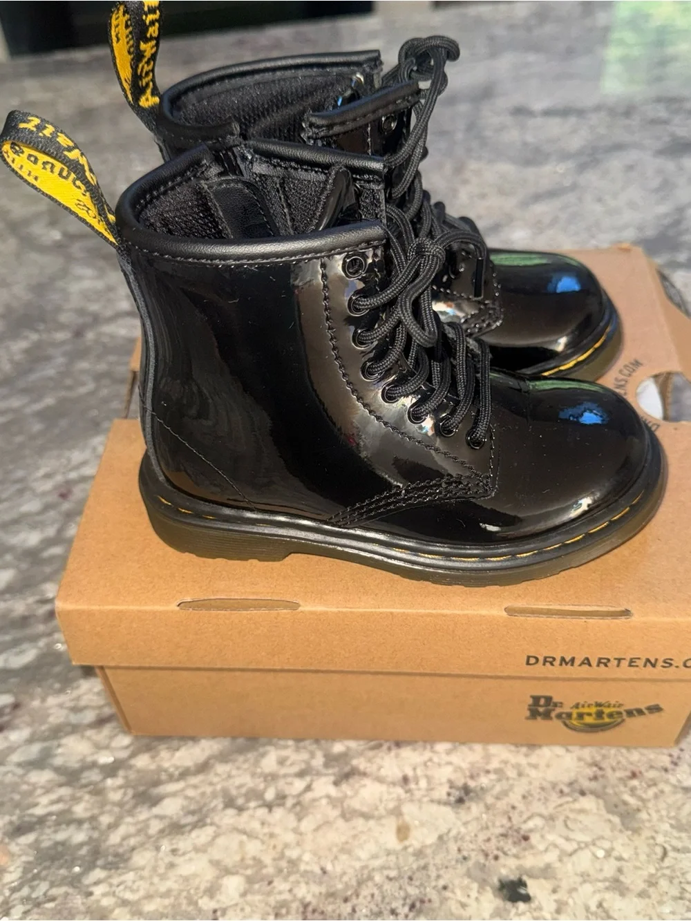 Like new Dr. Martens Black Patent Kids Lace-Up Boots with Yellow Stitching